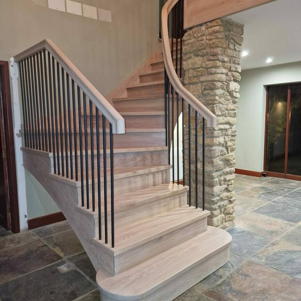 Curved Solid Oak Staircase Finished in White Oil