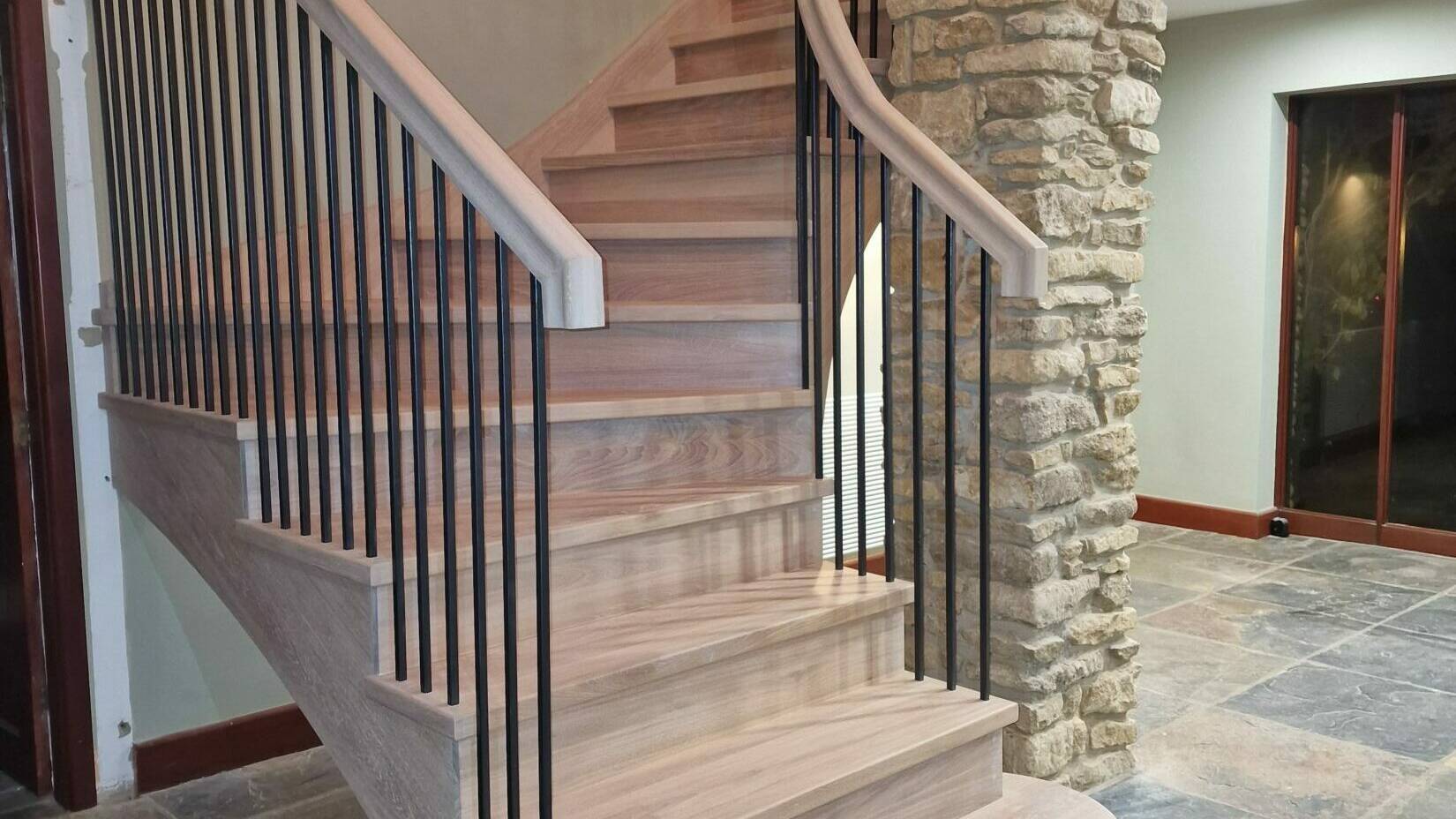 Curved Solid Oak Staircase Finished in White Oil